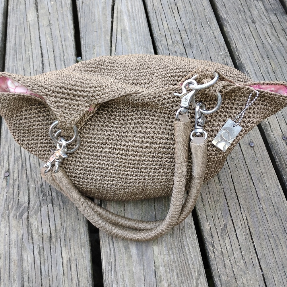 Lina handbag with a unique braided handle. Carry all your essentials